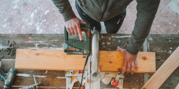 man performing a carpentry job