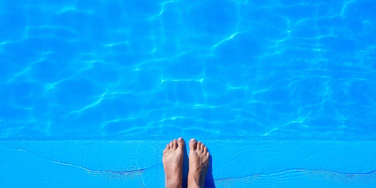 feet at a swimming pool