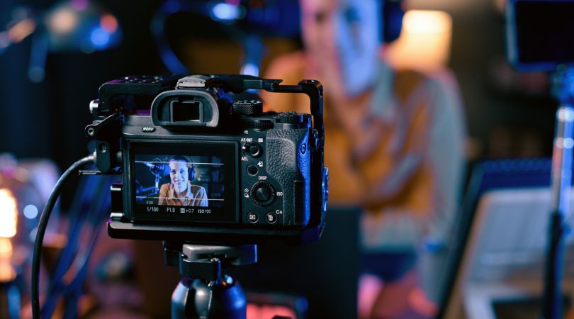 woman recording herself for YouTube