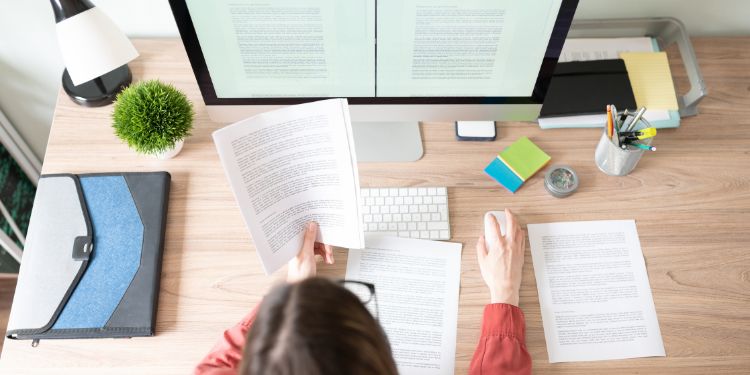 woman doing translation work at a desk